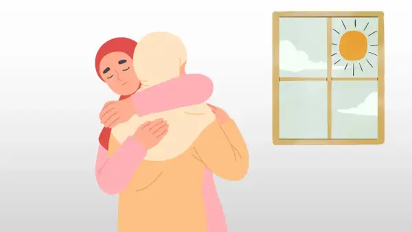 Två personer kramas. Den ena med sluten blick, kanske ett tecken på klinisk depression, får stöd. Utanför fönstret skiner solen.
