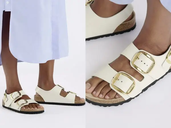 Białe sandały z dużymi złotymi klamrami, idealne na lato. Czy to Bayton czy Birkenstock, wybór należy do Ciebie!