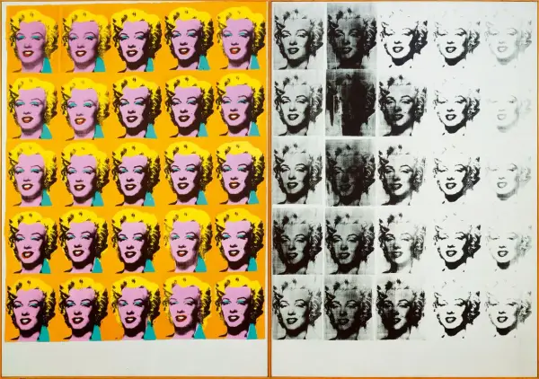 Marilyn Monroe en série, dans la technique d'Andy Warhol. Les portraits colorés contrastent avec les versions en noir et blanc, certaines estompées.