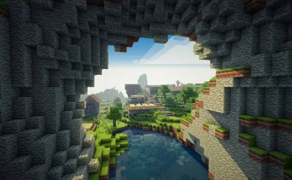 Widok na wioskę w najpopularniejszej grze na świecie, Minecraft. Woda, domki i zielone wzgórza.