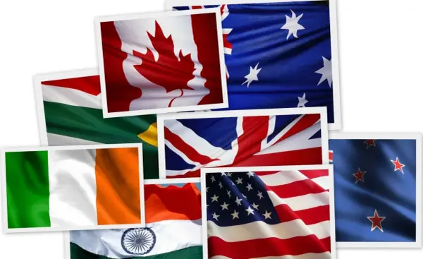 Flagi Kanady, USA, Wielkiej Brytanii, Australii, Irlandii, Indii, Nowej Zelandii i RPA. Zastanawiasz się, w ilu krajach mówi się po angielsku?