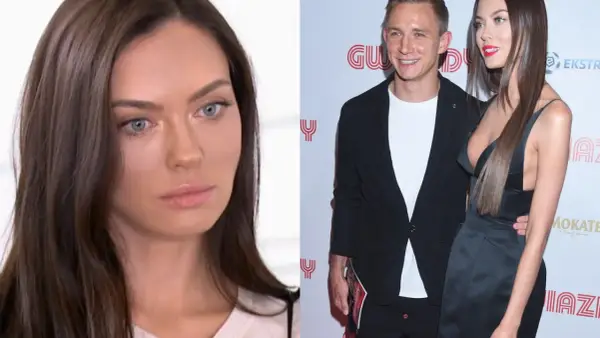Edyta Zając Rzeźniczak w ciąży, uśmiechnięta z partnerem na ściance.
