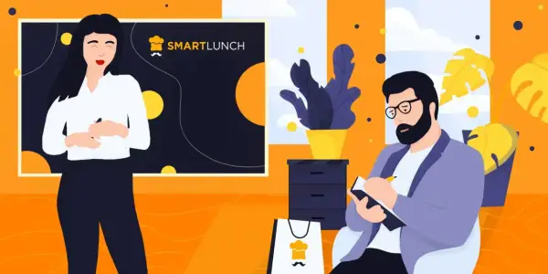 Kobieta prowadzi instruktaż, mężczyzna notuje. Na tablicy logo SMARTLUNCH.