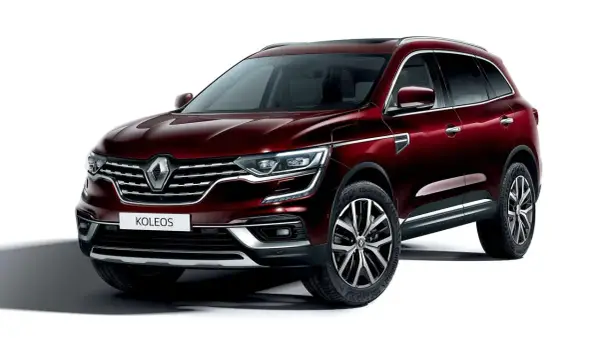 Elegancki, bordowy Renault Koleos 2.0 dCi z chromowanymi detalami i felgami 19 cali, gotowy na każdą podróż.