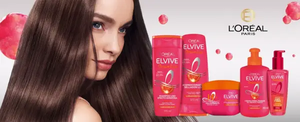 Mujer con pelo liso y sedoso, junto a productos L'Oréal Elvive Dream Liso para un cabello sin frizz.