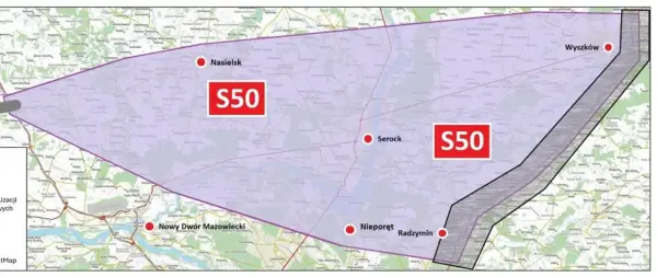 Mapa przedstawia przebieg planowanej trasy S50, zaznaczonej fioletową obwiednią, z kluczowymi punktami jak Nasielsk, Serock, Wyszków, Nieporęt i Nowy Dwór Mazowiecki.