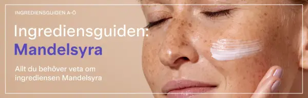 En närbild på en kvinna med fräknar som applicerar kräm. Texten lyder "Ingrediensguiden: Mandelsyra. Allt du behöver veta om ingrediensen Mandelsyra.