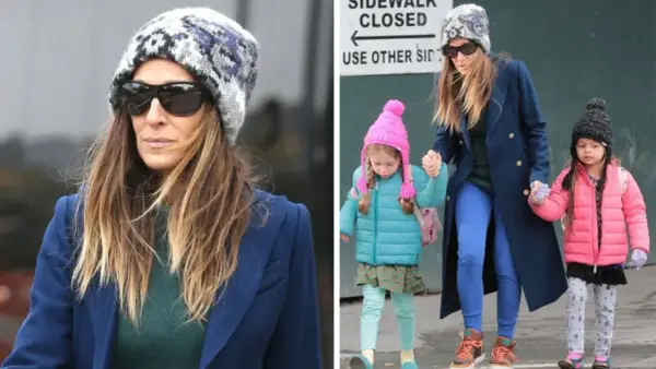 Sarah Jessica Parker z dziećmi, w zimowych czapkach i kurtkach, spaceruje po mieście.