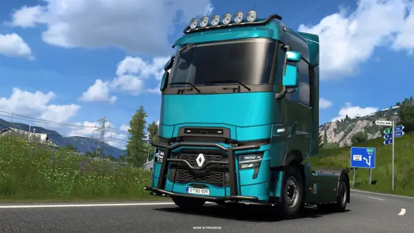 Turkusowa ciężarówka w Euro Truck Simulator 2 PS5 na górskiej drodze.