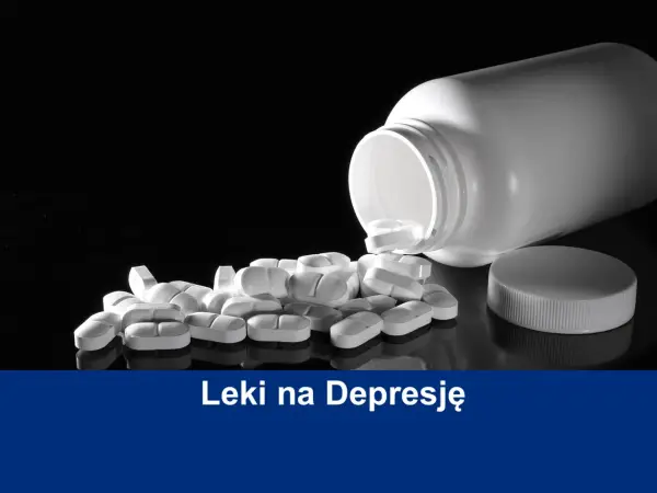 Białe tabletki rozsypane z butelki, symbolizujące leki na depresję. Dowiedz się, jak dostać leki na depresję.