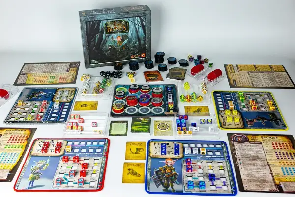 Plansza do gry "Too Many Bones" z kostkami, żetonami i kartami, gotowa do epickiej przygody w stylu gry RPG.