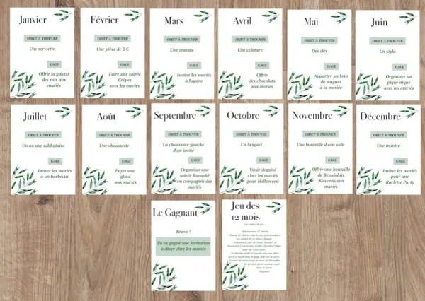 Cartes du jeu des 12 mois avec des gages et objets à trouver pour chaque mois, plus une carte gagnante.