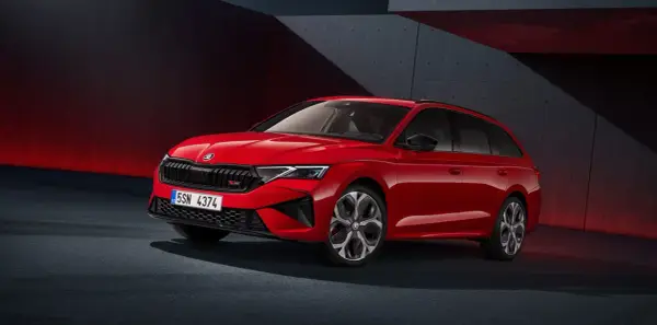 Czerwona Skoda Octavia RS kombi prezentuje sportowy design. Sprawdź aktualną skoda octavia cena i wyposażenie.