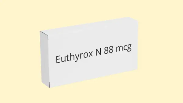 Białe pudełko leku Euthyrox N 88 mcg na jasnym tle.