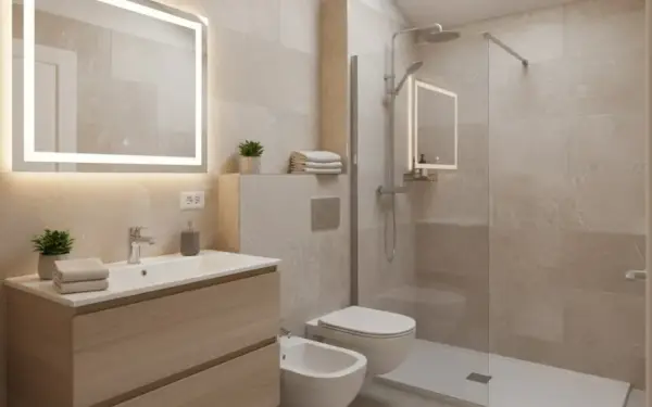 Bagno elegante piccolo con lavabo in legno, specchio luminoso, doccia walk-in e bidet.