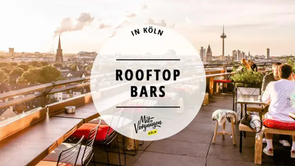 Genieße den Sonnenuntergang über Köln in einer stylischen Rooftop Bar. Perfekt für entspannte Abende mit Freunden.