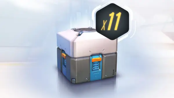Futurystyczna skrzynka z nagrodami (loot box) z symbolem "x11" w tle.