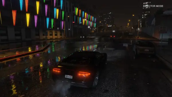 Nocna jazda w GTA 5 z ray tracingiem. Deszcz odbija kolorowe światła neonów od budynku na mokrej ulicy.
