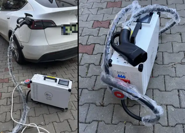Domowa stacja ładowania samochodów elektrycznych cena. Biała Tesla podłączona do ładowarki na kostce brukowej.