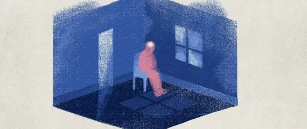 Samotna postać w różowym ubraniu siedzi na krześle w niebieskim pokoju. Światło wpada przez okno i drzwi, ale nie rozprasza mroku. To obraz najbardziej depresyjnego dnia w roku.