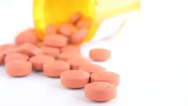 Escitalopram - dawkowanie, skutki uboczne i interakcje