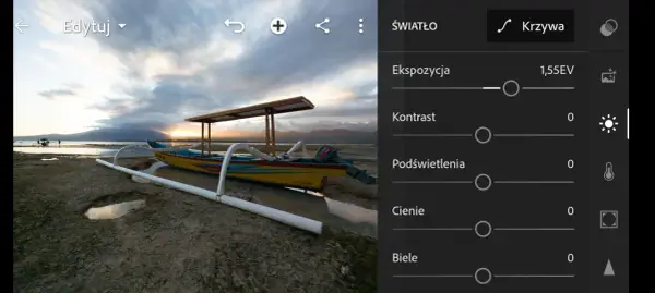 Żółta łódź na plaży o zachodzie słońca, edycja pliku raw, ekspozycja 1,55EV.