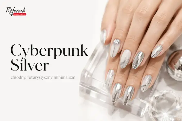 Dłonie z paznokciami w stylu "Cyberpunk Silver". Efekt lustra na białym lakierze, futurystyczne linie i błyszczące zdobienia.