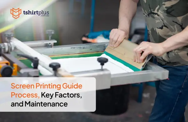 A person demonstrates how to screenprint, using a squeegee to apply ink on a screen. This image is part of a guide on the screen printing process.