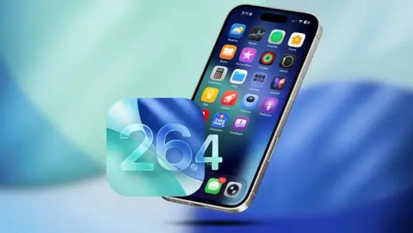 Nowe funkcje w iOS 26.4 na iPhonie: ikony aplikacji, w tym "Instamart", i powiadomienia.