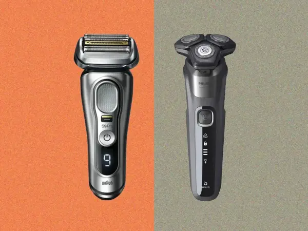 Dos afeitadoras eléctricas modernas, una Braun S9 Pro y una Philips, listas para ser tu primera máquina de afeitar.