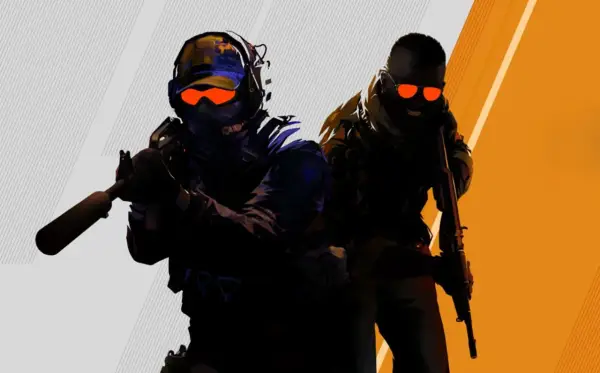 Dwóch żołnierzy z gry Counter-Strike 2, z pomarańczowymi okularami i bronią, gotowych do akcji.