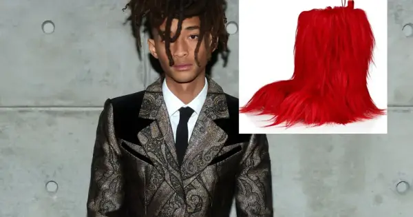 Jaden Smith, syn Willa Smitha, w ekstrawaganckim garniturze obok jaskrawoczerwonych, futrzanych butów.
