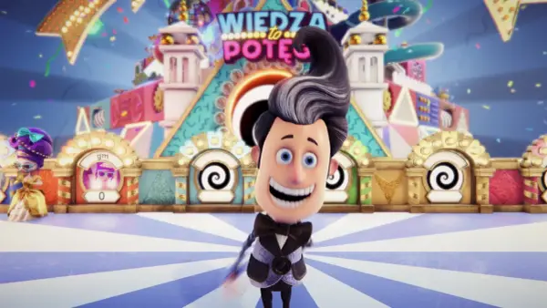 Wesoły prowadzący w garniturze na tle scenografii "Wiedza to potęga", przypominającej gry podobne do wiedza to potęga.