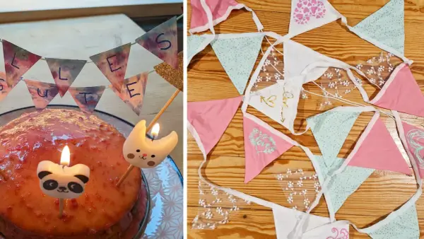 Geburtstagstorte mit Kerzen und einer selbstgemachten Wimpelkette. Daneben liegen weitere bunte Wimpelketten zum Basteln.