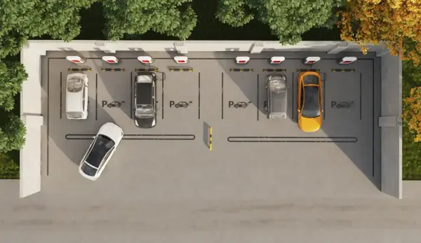 Widok z góry na parking z kilkoma samochodami, w tym żółtym i białym. Widać ładowarki do samochodów elektrycznych, sugerujące funkcję asystenta parkowania.