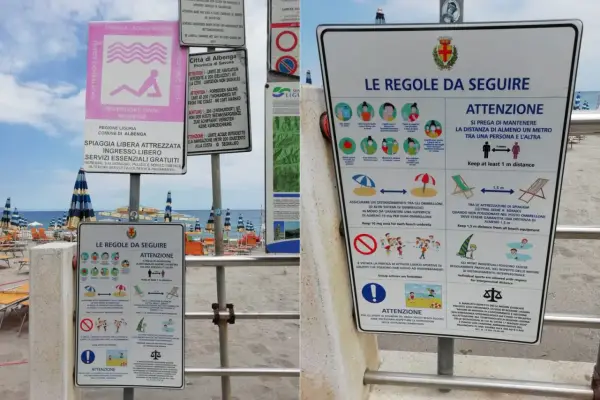 Cartelli informativi su una spiaggia libera attrezzata con regole di distanziamento e norme di comportamento.