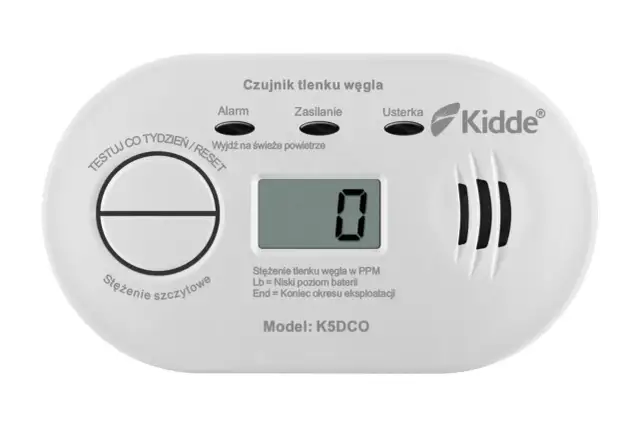 Biały czujnik tlenku węgla Kidde z wyświetlaczem pokazującym "0" i przyciskiem Test/Reset.