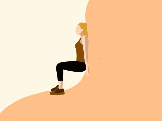 Przysiad przy ścianie - Jak poprawnie robić wall sit i unikać błędów?