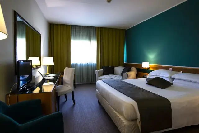 Hotel Oly Roma: Guida Completa EUR | Posizione & Servizi