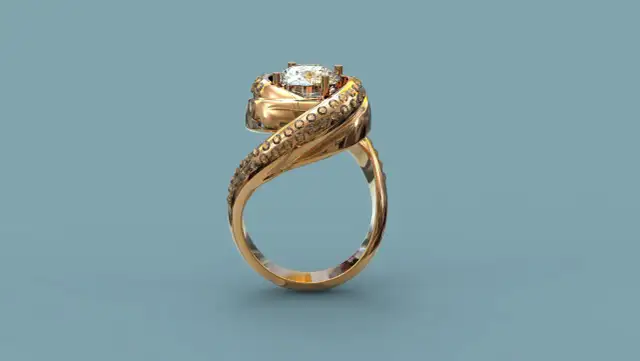 Elegancki pierścionek ze złota, ozdobiony błyszczącymi kamieniami, przypominającymi kryształy Swarovski.
