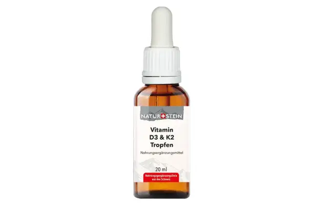 Braune Glasflasche mit Pipette, gefüllt mit Vitamin D3 & K2 Tropfen.