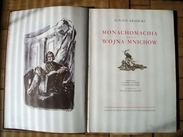 Otwarta księga z ilustracją i tekstem "Monachomachia czyli Wojna Mnichów" Ignacego Krasickiego. To satyra do króla, która w dowcipny sposób ukazuje spory między zakonnikami.