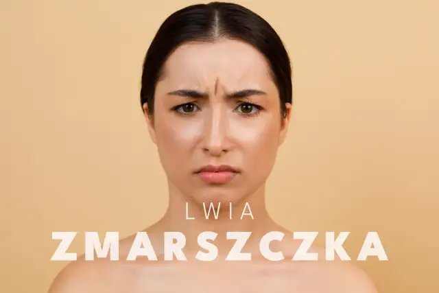 Kobieta z wyraźną lwia zmarszczka między brwiami, zamyślona.