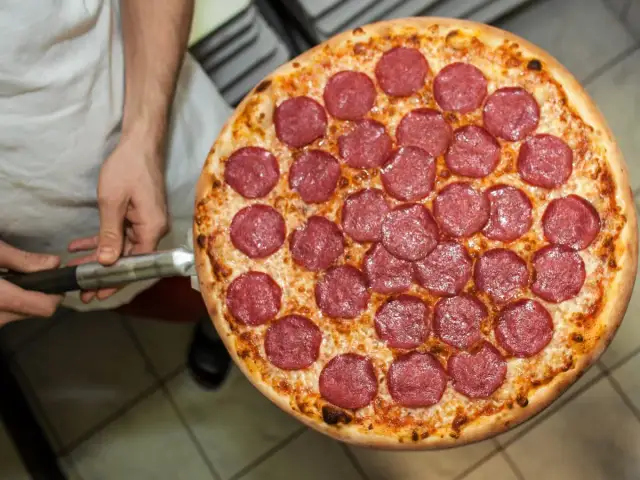 Zarobki dostawcy pizzy w Polsce: Ile naprawdę zarobisz?