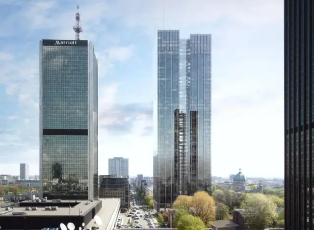 Nowoczesne wieżowce, w tym Marriott i roma tower, dominują nad panoramą miasta.