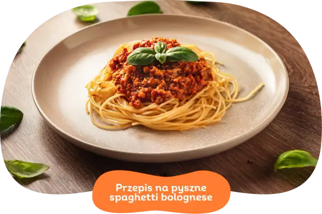 Pyszne spaghetti bolognese z aromatycznym sosem mięsnym i świeżą bazylią. Idealne na szybki obiad.