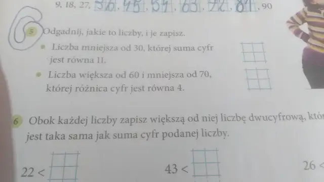 Fragment zeszytu z zadaniami matematycznymi, widoczne liczby i tekst.