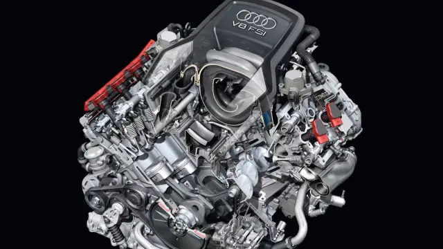 Przekrój silnika Audi V8 FSI z widocznymi tłokami, zaworami i układem wtrysku paliwa.