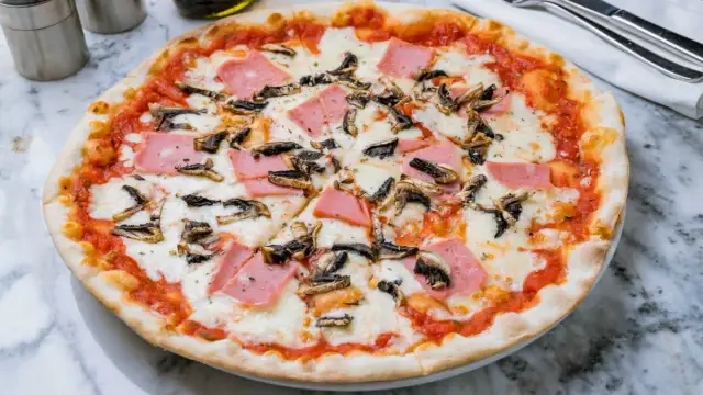 Pizza Reine maison : la recette facile pour un succès garanti !