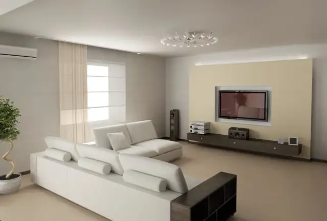 Nowoczesny salon z białymi sofami i designerskim oświetleniem sufitowym. Świetny pomysł na sufit w salonie, który dodaje elegancji.
